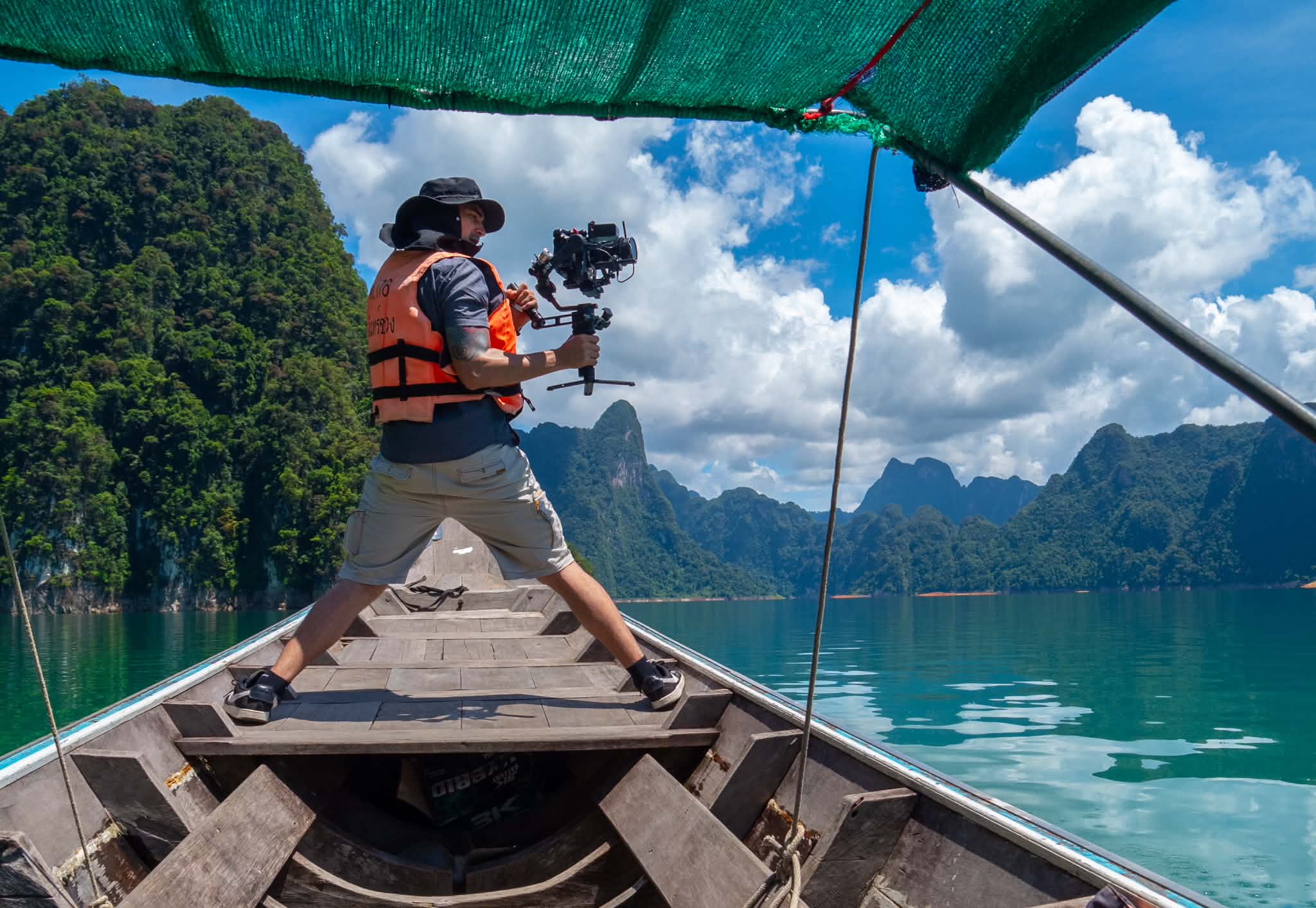 Shooting on longtail boat